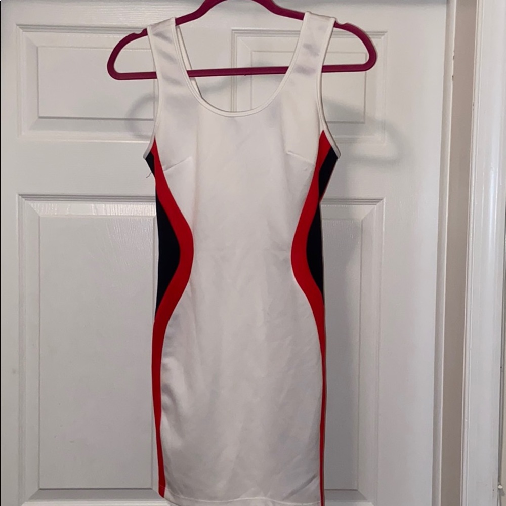 Short white dress with black and red on the Sides